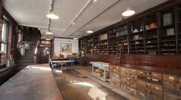 interior of Adams Heritage Centre showing Victorian wooden shelving