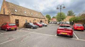 The barn and car park at Littleport